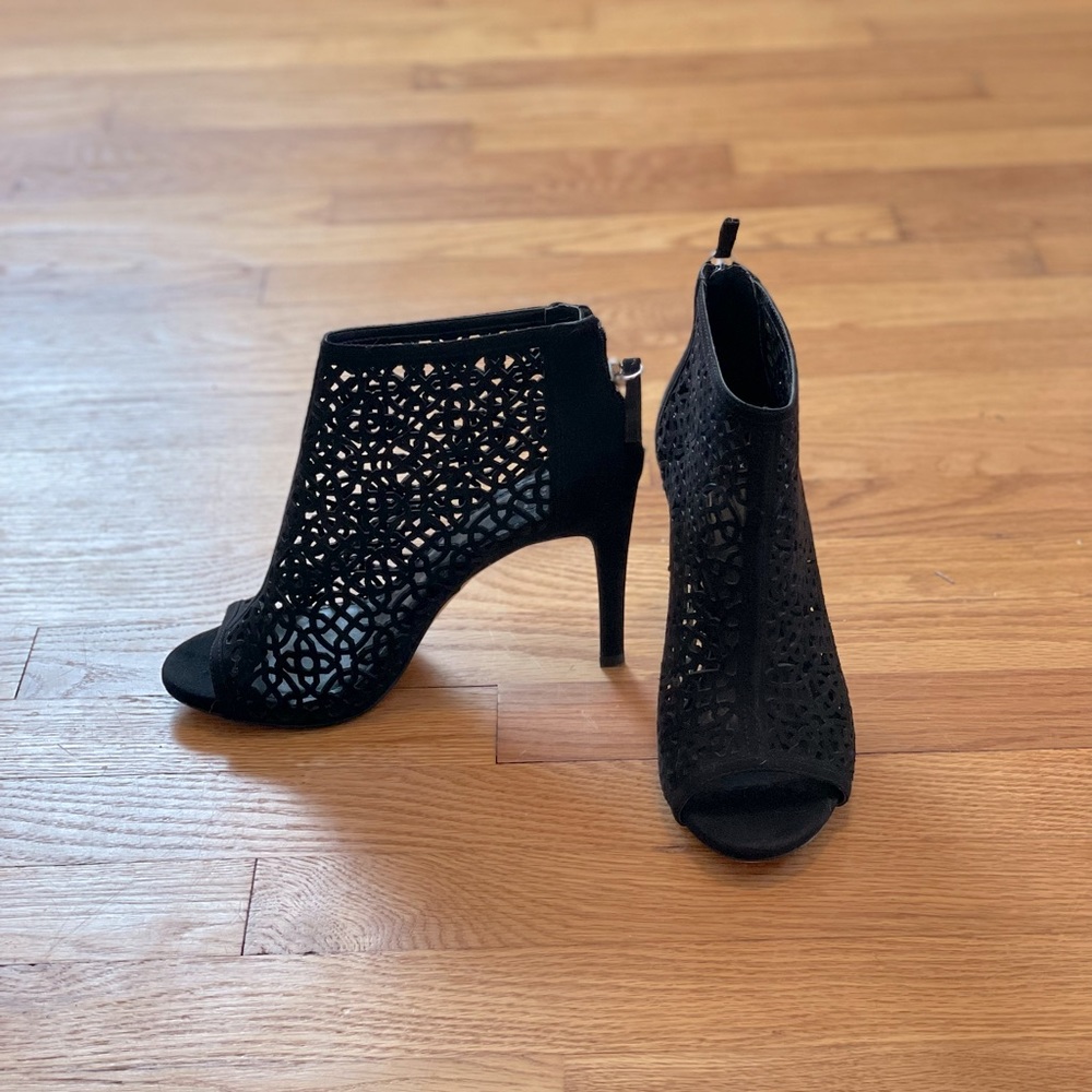 Black laser-cut suede stiletto ankle booties, size 7.5